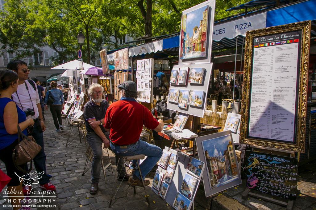 Montmartre is a large hill in Paris's 18th arrondissement. It is 130 metres high and gives its name to the surrounding district, part of the Right Bank in the northern section of the city.